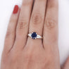 1.84 Carat Oval Cut Dark Blue Sapphire and Diamond Ring