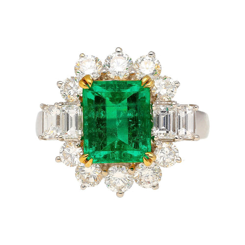 4.42 Carat TW Colombian Emerald with Round & Emerald Cut Diamond Halo Ring