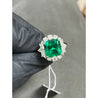 5.20 carat Minor Oil Colombian Emerald and Diamond Halo Ring