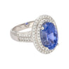 6.34 Carat No Heat Oval Cut Blue Sapphire and Diamond Halo 18K Ring GRS Certified