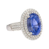 6.34 Carat No Heat Oval Cut Blue Sapphire and Diamond Halo 18K Ring GRS Certified