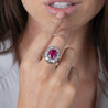 Art Deco AGL Certified No Heat 5.52 Carat Oval Cut Burma Ruby and Round Diamond Halo Ring