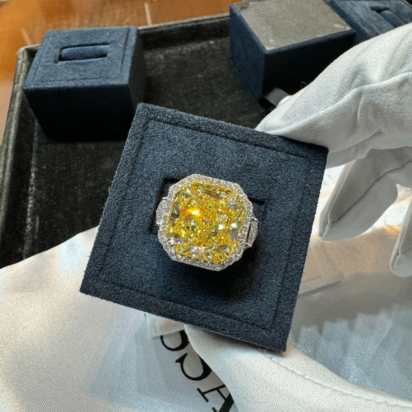 GIA Certified 13.14 Carat Fancy Intense Yellow Diamond VVS1 Halo 18K Ring
