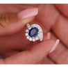 GIA Certified 2.18 Carat Oval Blue Sapphire & Diamond Platinum Bypass Halo Ring