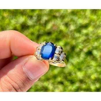 Retro Style Chanthaburi Blue Sapphire ring with Baguette Diamond Sidestones – Assay Jewelers