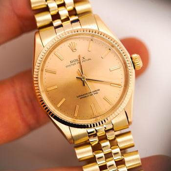Rolex Oyster 1005 Champagne Dial Gold Vintage Watch – Assay Jewelers