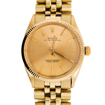 Rolex Oyster 1005 Champagne Dial Gold Vintage Watch – Assay Jewelers
