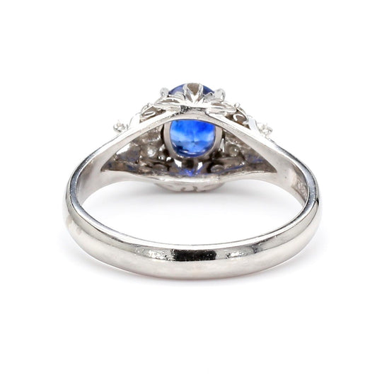 Vintage 0.97 Carat Oval Blue Sapphire & Diamond Filigree in Platinum Floral Ring