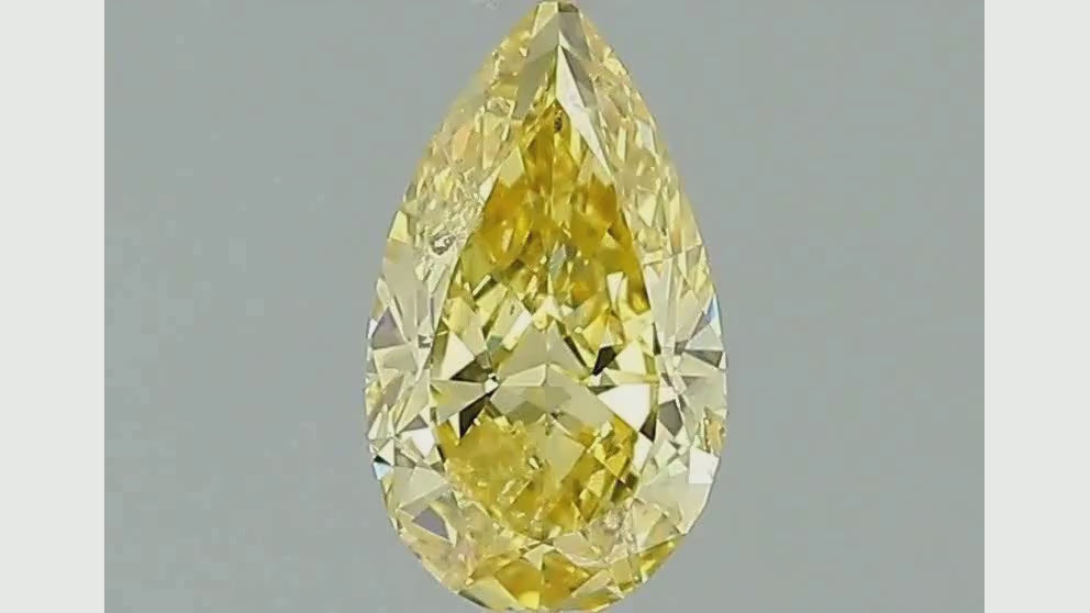 GIA Certified 0.81 Carat Fancy Vivid Yellow Pear Cut Loose Natural Diamond